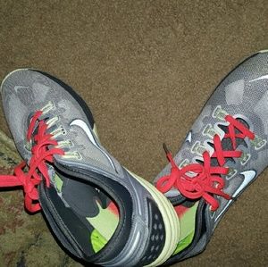 Gray with neon orange and yellow Nike Lunarlons 10