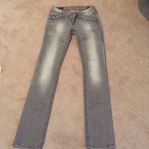 Grey boot cut jeans. Never worn