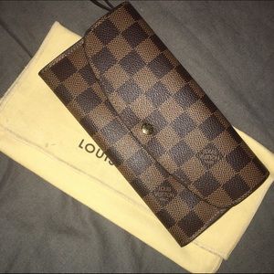 Louis Vuitton Emilie wallet in Damier Ebene