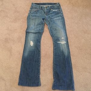 Flare legged jeans with rips