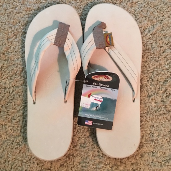 New with tag rainbow flip-flops.