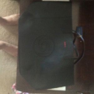 Bebe fold up tote/bag.