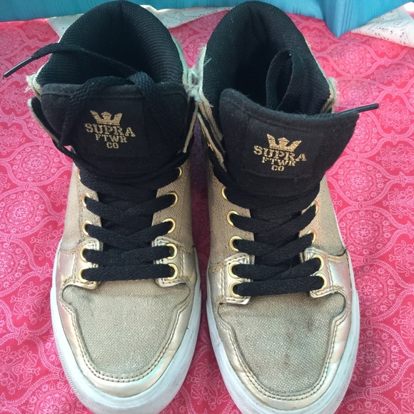 Gold supra footwear