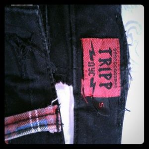 Tripp NYC half tartan plaid half black pants