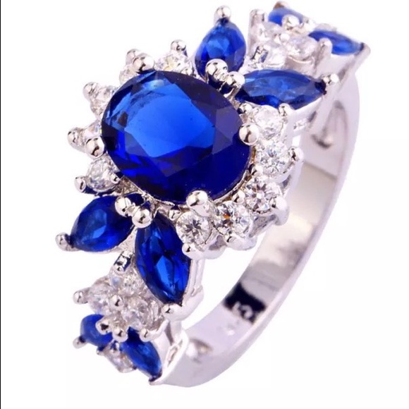 BLUE TOPAZ SET IN WHITE GOLD OVER 925 SILVER - Picture 2 of 2