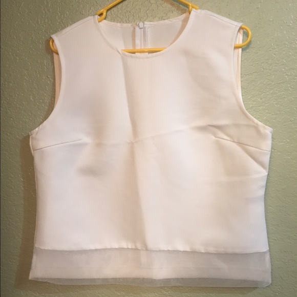 White sleeveless top