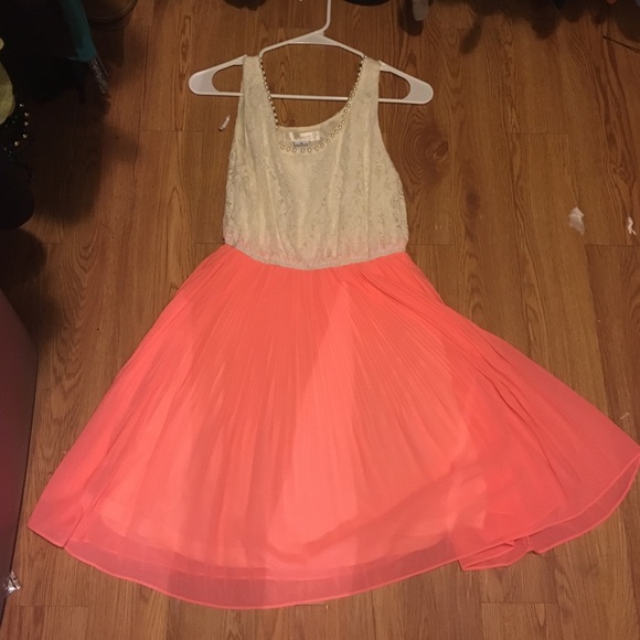 Coral pink and lace dress