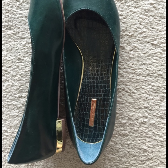 Gold heel emerald flats