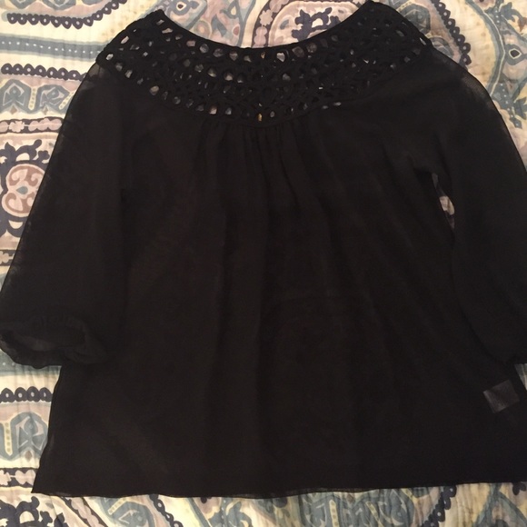 Umgee lattice detailed sheer top.