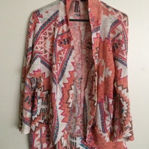 Aztec-patterned cardigan.