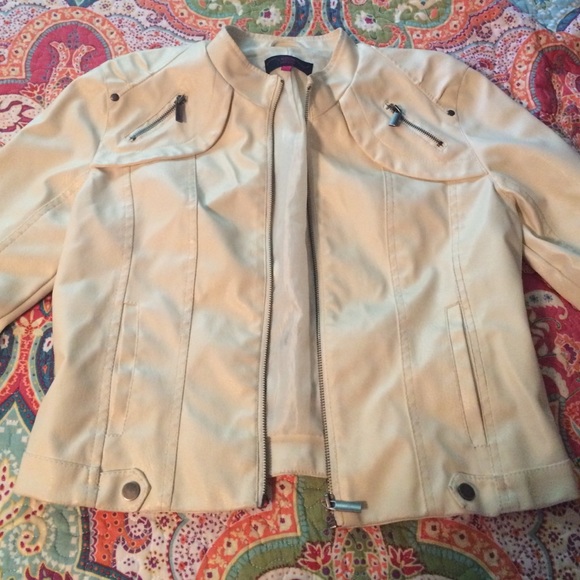 White faux leather jacket.