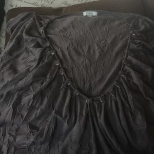 Cache sleeveless top