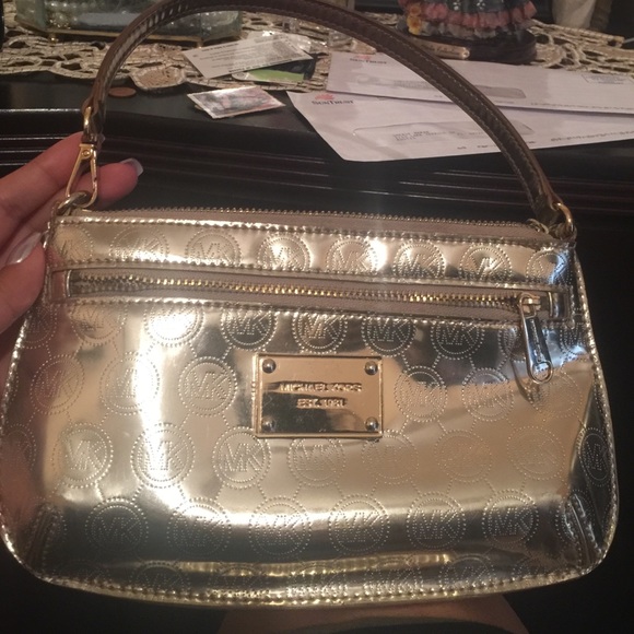 Micheal Kors metallic wristlet
