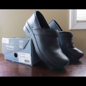 Black oiled Dansko professional clogs