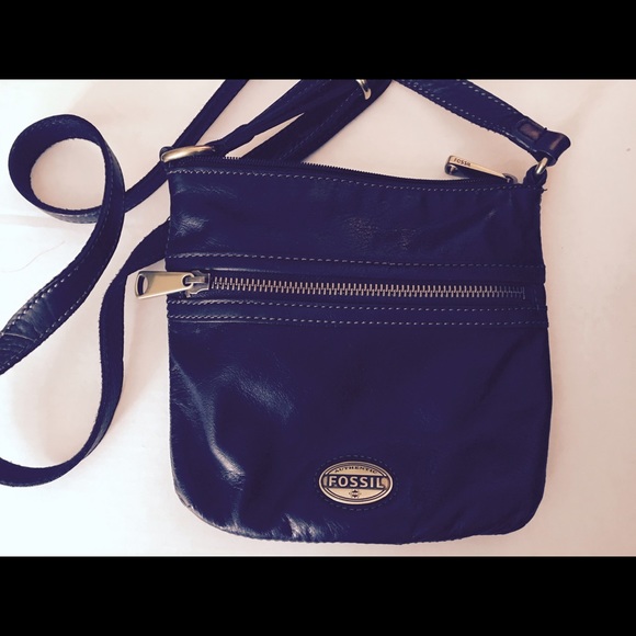 Dark brown leather Fossil crossbody purse.