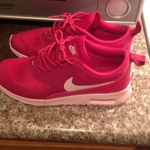 Their Nike sneakers used only worn twice