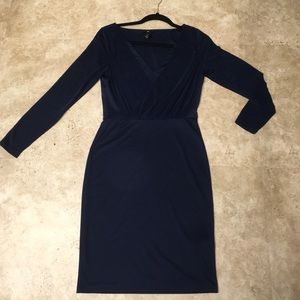 Navy blue long sleeve dress with sheer sleeves.