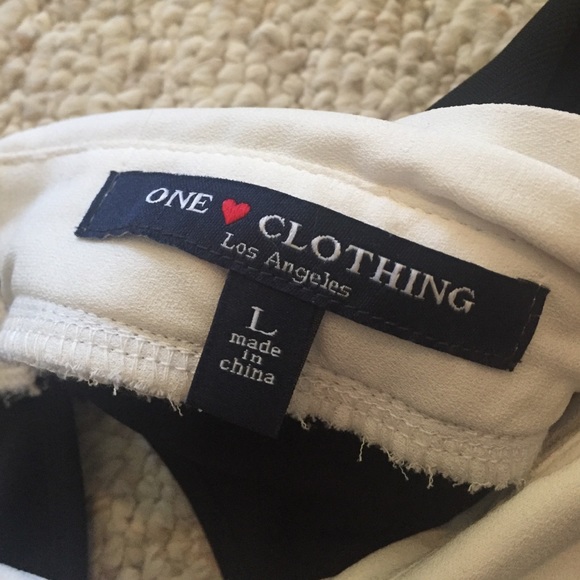 Black and white collared shirt. - Picture 2 of 3