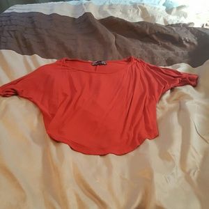 Orange cold shoulder top.
