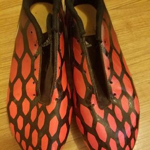 Mens size 8.5 soccer shoes.