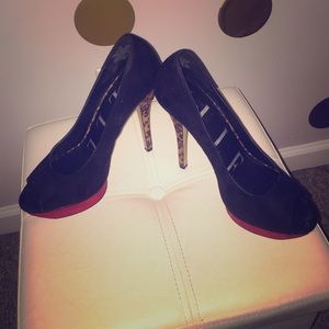 Black, red and leopard peep toe pumps