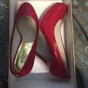 Red patent Michael Kors pumps