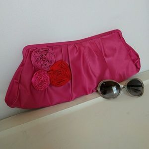 Pink satin rosette clutch