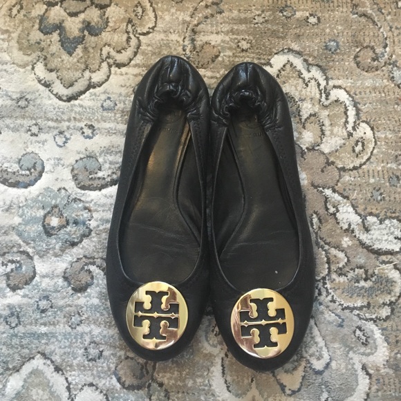 Tory butch black flats with gold medallion