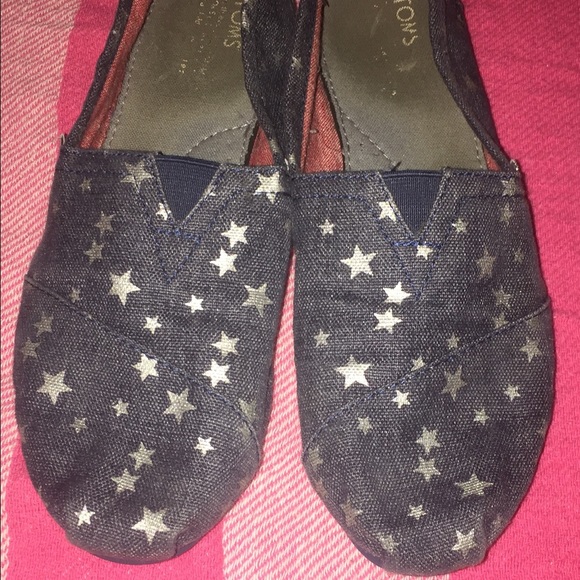 Navy blue Toms with silver stars
