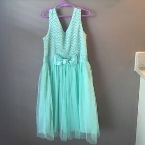 Mint green dress with tiny hole in the side!