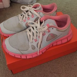 Pink and gray Nikes