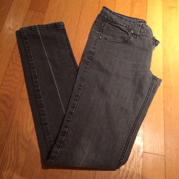 Slightly faded black skinny jeans
