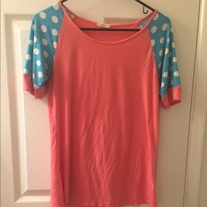 Salmon/pink shirt / blue/ white polka dot