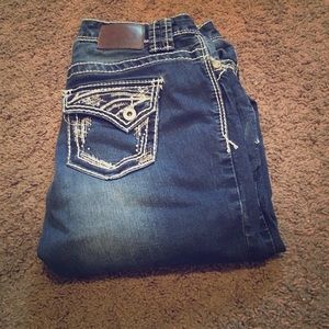 Thick stitched jeweled denim jeggings
