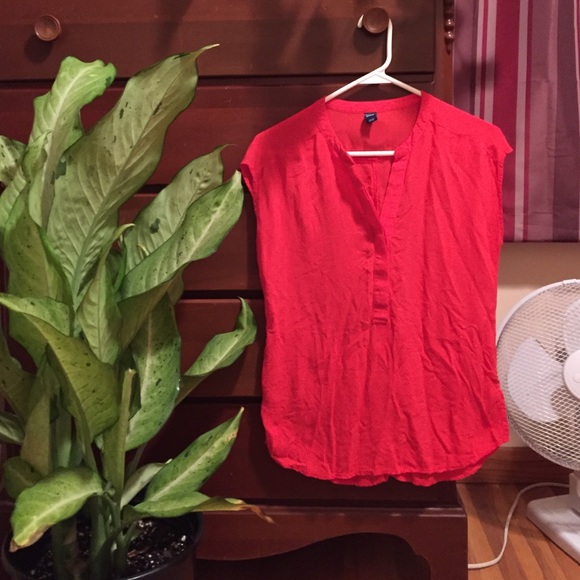 Red sleeveless blouse