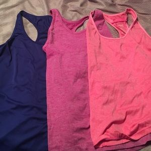 3 medium workout tank bundle.