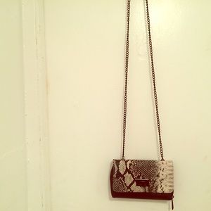 Snake print clutch