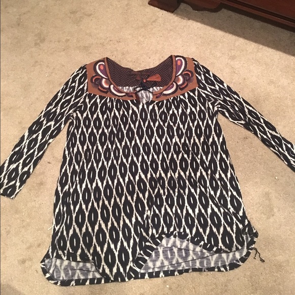 Cute light multi colored shirt.