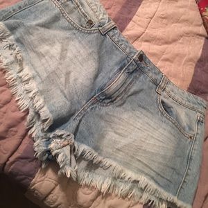Destressed jean shorts