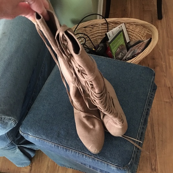 Knee length suede boots with tie up back detail
