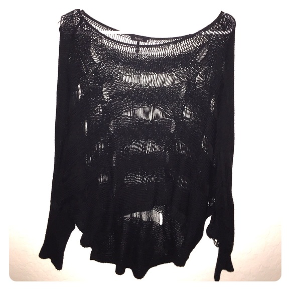 Nollie black ripped sweater