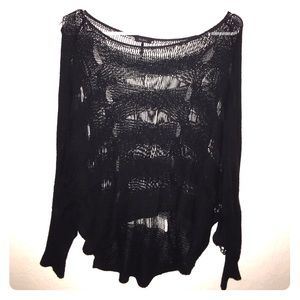 Nollie black ripped sweater