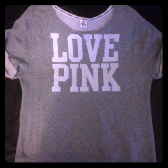 PINK: 80's style crew neck short sleeve sweater.