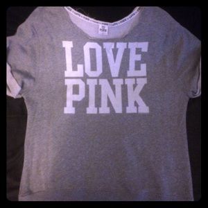 PINK: 80's style crew neck short sleeve sweater.