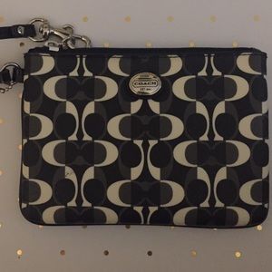 Black and white Coach wristlet