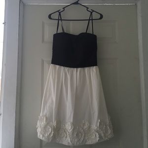 A formal black and white cocktail dress