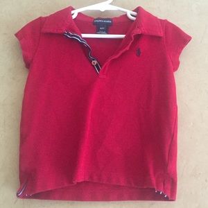 A red polo shirt