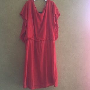An orange ruffle dress