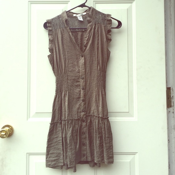 An olive mini dress with lace details.