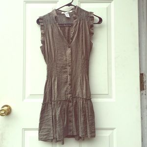 An olive mini dress with lace details.